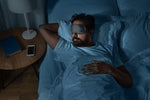 man sleeping after taking cbd sleep capsules